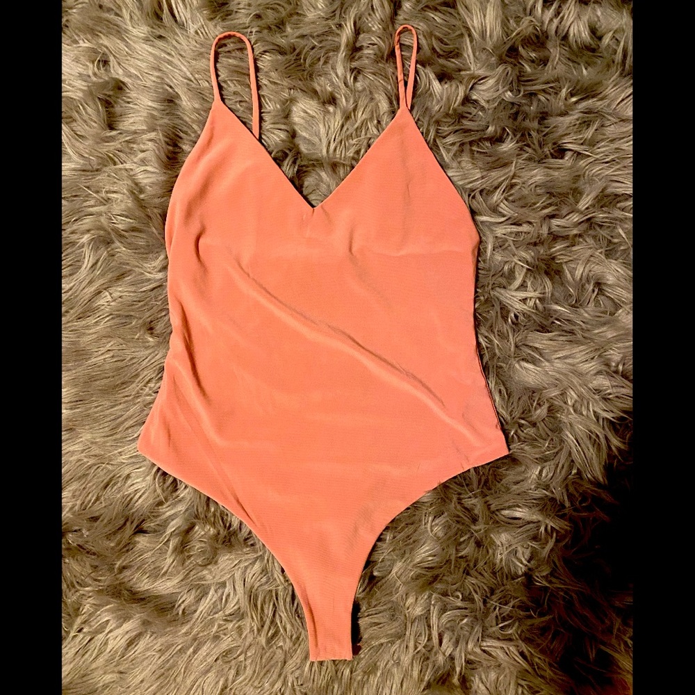 Pink plunge bodysuit